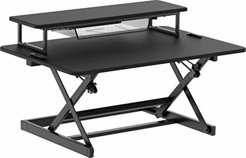 Adjustable standing desk converter with black finish.