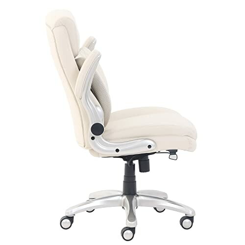 Side view of an ergonomic office chair with armrests and caster wheels.