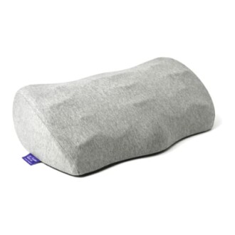 Gray ergonomic neck pillow with a contoured design.