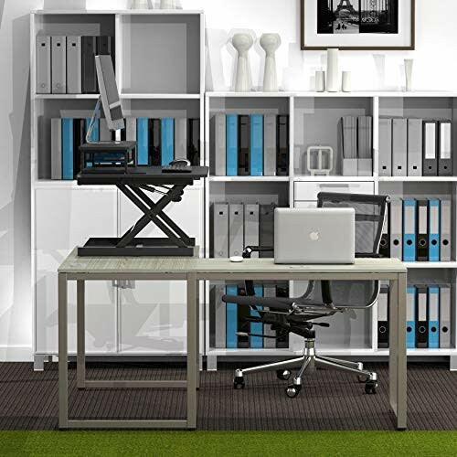 Modern office with standing desk, chair, and shelves